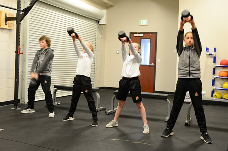 Healthy Body - kettlebells in weight room