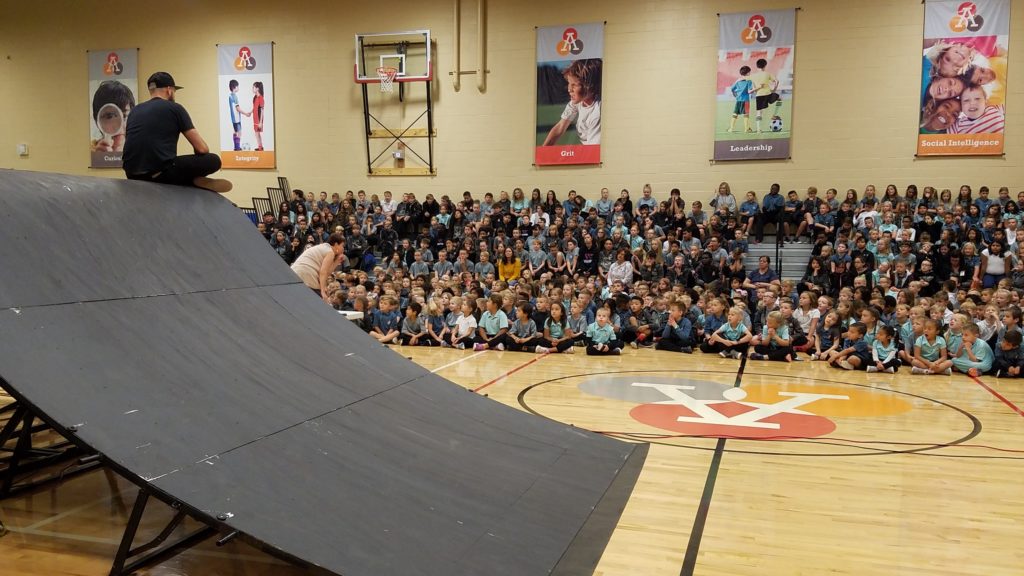 5050BMX bike tricks at bullying prevention assembly